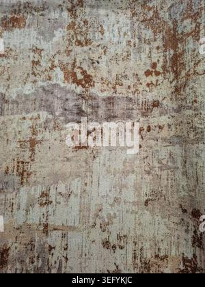 The background shows a textured surface with rusty brown and grey tones. This aged look suits various creative projects and adds an antique touch to d Stock Photo
