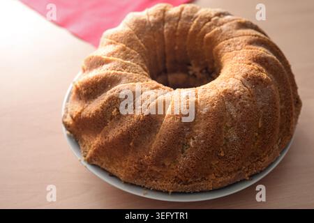 Classic Gugelhupf, traditionally baked in a distinctive ring mould, similar to a bundt cake, popular in in Central Europe, copy space, selected focus, Stock Photo