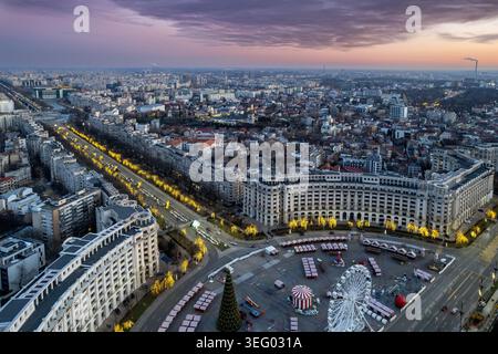 Aerial view of the illuminated market square and historic city center ...