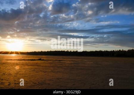 Dramatic Golden Sunset Over Open Field at Bruce Peninsula Stock Photo