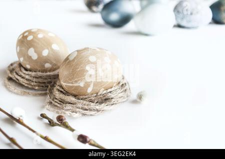 Pastel composition for the holiday of Easter. Colored eggs in natural colors. Background for the presentation of work or text. Stock Photo