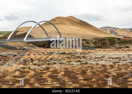Modern bridge along Iceland's famous Ring Road (Route 1) over Eldhraun, a vast, moss-covered lava field in southern Iceland, Europe Stock Photo