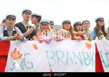 Malmo, Sweden - June 5, 2026: Happy high school students celebrate their graduation traditionally on a truck bed. Stock Photo