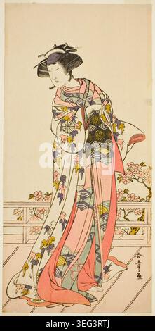The Actor Nakamura Tomijuro I in an Unidentified Role by Katsukawa Shunsho, c. 1777, depicting a kabuki performer in elaborate kimono with floral patterns and long trailing sleeves, standing on a wooden platform Stock Photo