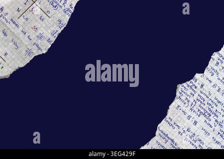 Torn graph paper with handwritten math notes frames, empty copy space on dark blue background. Back to school. Concept of math study, education, exam Stock Photo