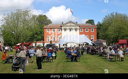 Family crowds enjoy Warrington Food & Drink Festival on Town Hall lawn, Bank Park, in spring sunshine on Sunday 17/05/2026 Stock Photo