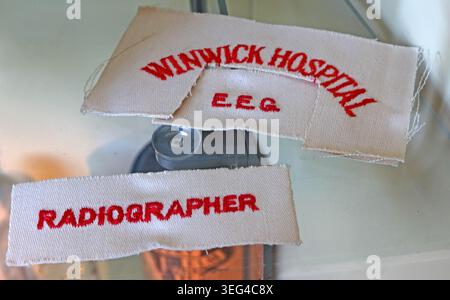 Winwick Hospital EEG and radiographer uniform badges, memorabilia from the former psychiatric hospital near Warrington, England, UK. Stock Photo