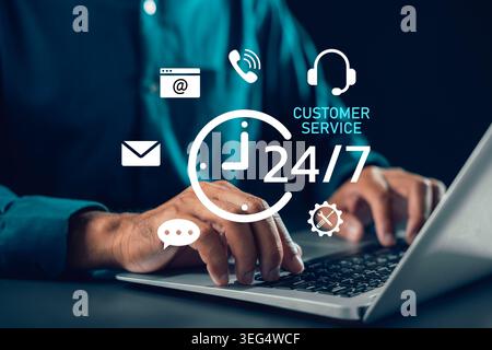 Call support 24 7 is worldwide available for customer service contact assistance, delivery icons appear while hands type on laptop keyboard for nonsto Stock Photo