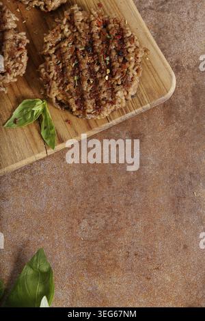 Food. Delicious cutlet on the wooden board Stock Photo