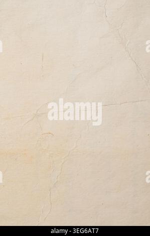 Warm beige weathered paper with distressed dark borders and an empty ...