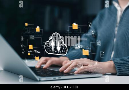 Cloud computing file transfer and digital document management concept. User using laptop with cloud upload and download icon, connected folder, secure Stock Photo