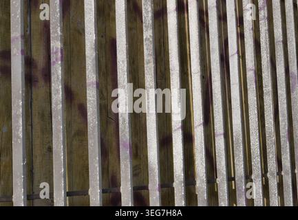 TEXTURE BACKGROUND OF AN OLD RUSTY METAL GRATE Stock Photo