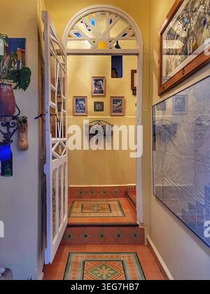 Warmly lit interior of a traditional Moroccan guesthouse or riad, 3 August 2025, Chefchaouen, Morocco. Stock Photo