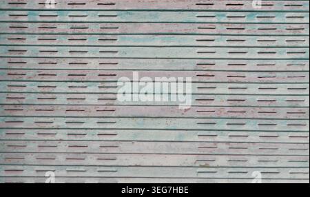 TEXTURE BACKGROUND OF AN OLD RUSTY METAL SHUTTER Stock Photo