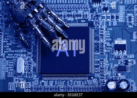 Robot hand touching ai processor on circuit board Stock Photo