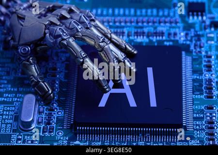Robot hand touching ai chip on circuit board Stock Photo