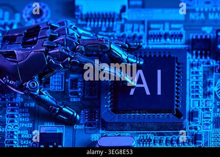 Robot hand touching ai chip on circuit board Stock Photo
