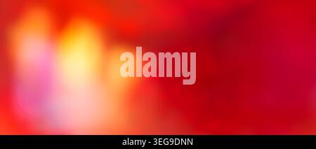 Vivid red and orange abstract gradient background with bright glowing light burst and fiery warm tones Stock Photo