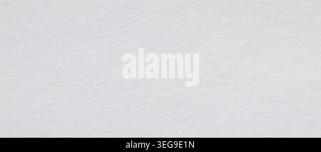White watercolor paper texture with subtle rough grain surface as a minimal background Stock Photo