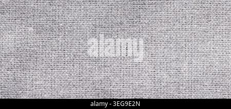 Light gray woven linen fabric texture with natural melange fiber surface as a horizontal background Stock Photo