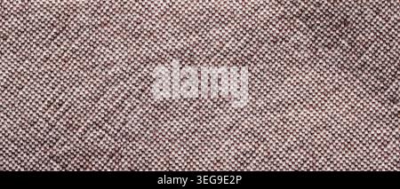 Brown wool tweed fabric texture with woven herringbone pattern for cozy textile background close-up Stock Photo