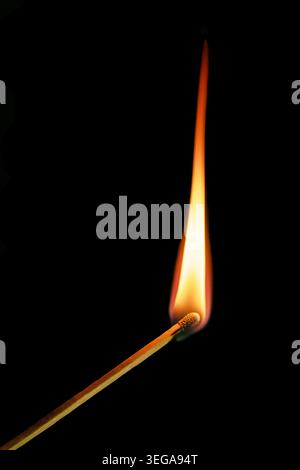 Burning Match Flame Isolated On Black Background Stock Photo