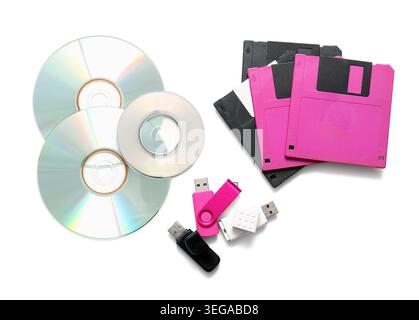 USB flash drives, CD and floppy disks on white background Stock Photo