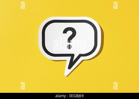 Question mark on speech bubble isolated on yellow background. Doubt, confusion, uncertainty concept Stock Photo