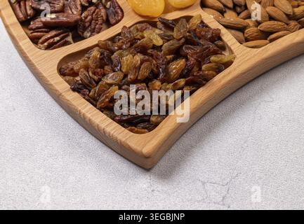 Snack mix of various healthy dried fruits and nuts Stock Photo