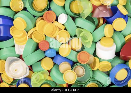 Variety of colorful plastic screw caps background Stock Photo