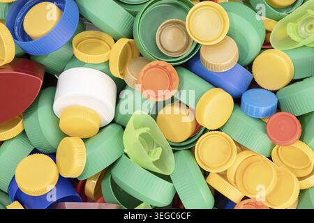 Variety of colorful plastic screw caps background Stock Photo