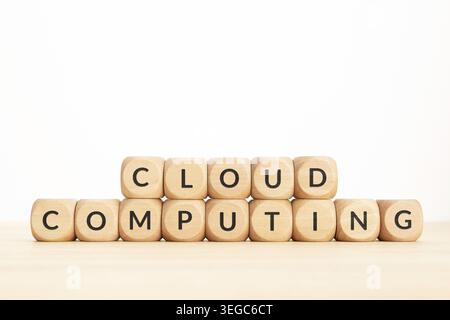 Cloud Computing phrase on wooden blocks. Copy space Stock Photo