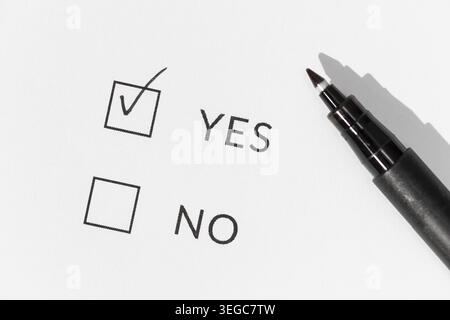 Yes or No Check boxes on white paper Stock Photo