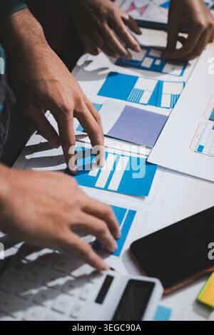 UI designer and UX developer brainstorm idea to design the application appearance in the early stage. Creative digital development agency. UX UI conce Stock Photo