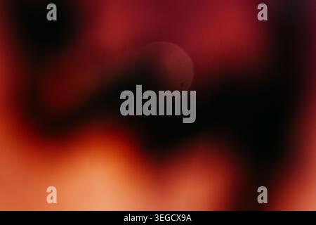 Abstract background with red and orange light leaks, blur, shadow, soft circle shape for design use. Vintage grunge background texture for film Stock Photo