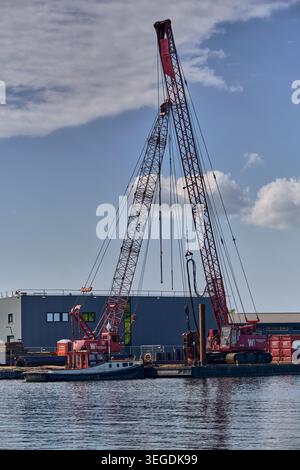 Industrial Construction And Marine Engineering, Sheet Piling Rig On Pontoon In Zaan River Stock Photo