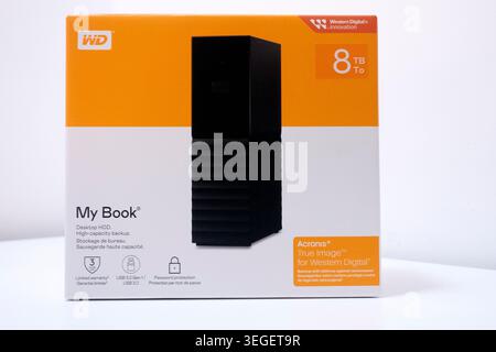 Western Digital 8TB external hard drive boxed isolated against a plain background. WD My Book computer backup external hard drive Stock Photo