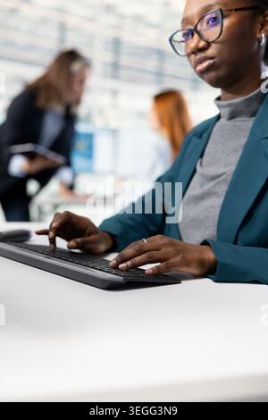 Training AI model, RD and close up of software developer in microchip factory RD office optimizing hardware. Using artificial intelligence, improving manufacturing efficiency and IT expert Stock Photo