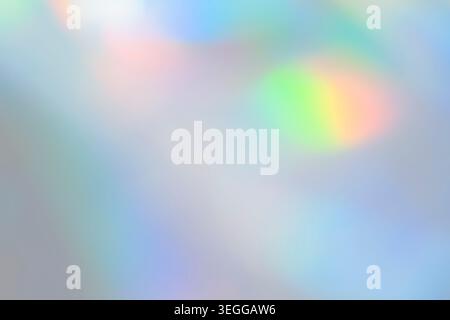 Abstract blurred holographic pastel rainbow gradient background Stock Photo