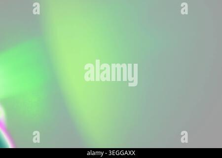 Vibrant light green abstract background with angled pastel magenta flares Stock Photo