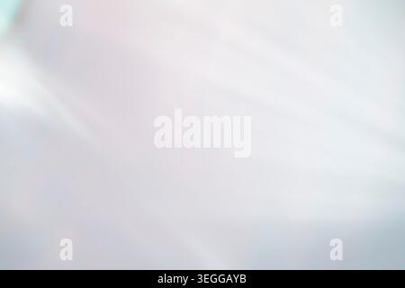 Abstract soft pale blue gradient background with smooth diagonal light rays and subtle textures Stock Photo