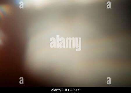 Soft warm light glowing abstractly with blurred defocused lens effects and smooth cinematic gradient tones Stock Photo