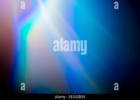 Vibrant diagonal light streaks in cyan and purple tones Stock Photo