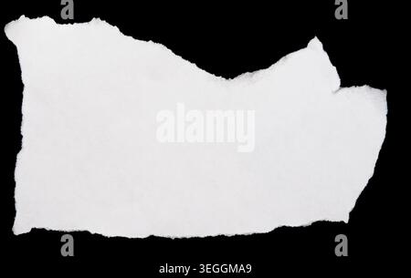 Ripped paper on black background Stock Photo
