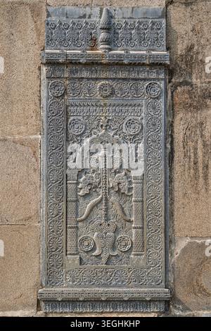 Closeup vertical view of stone panel with floral and geometric design carving at ancient Chhoto Sona masjid, Shahabazpur, Chapai Nawabganj, Bangladesh Stock Photo