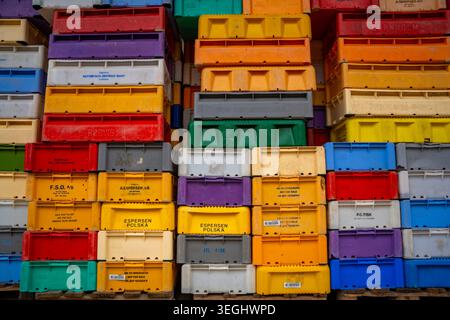 Sassnitz, Germany - May 3, 2026: Stacked colorful fish crates at fishing harbor in Sassnitz on Ruegen island, Germany Stock Photo