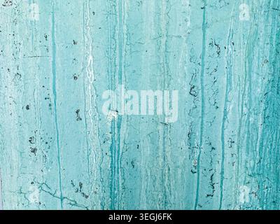 Turquoise Weathered Wall Texture with Cracks and Peeling Paint Stock Photo