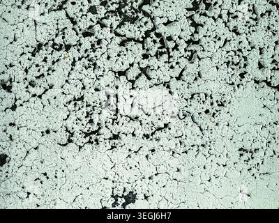 Abstract Texture of Cracked Peeling Paint on Wall Surface Stock Photo