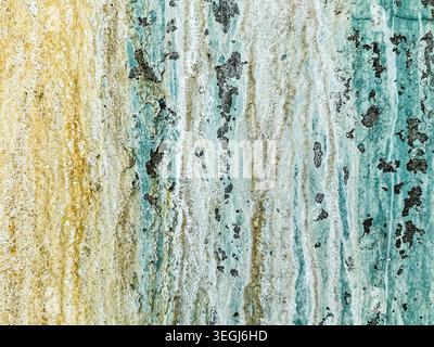 Abstract Textured Surface with Earthy Green and Yellow Tones Stock Photo