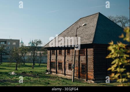 A two-story wooden house in spring Stock Photo